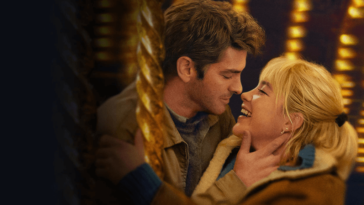 Andrew Garfield kisses Florence Pugh in the 2024 film, We Live in Time.